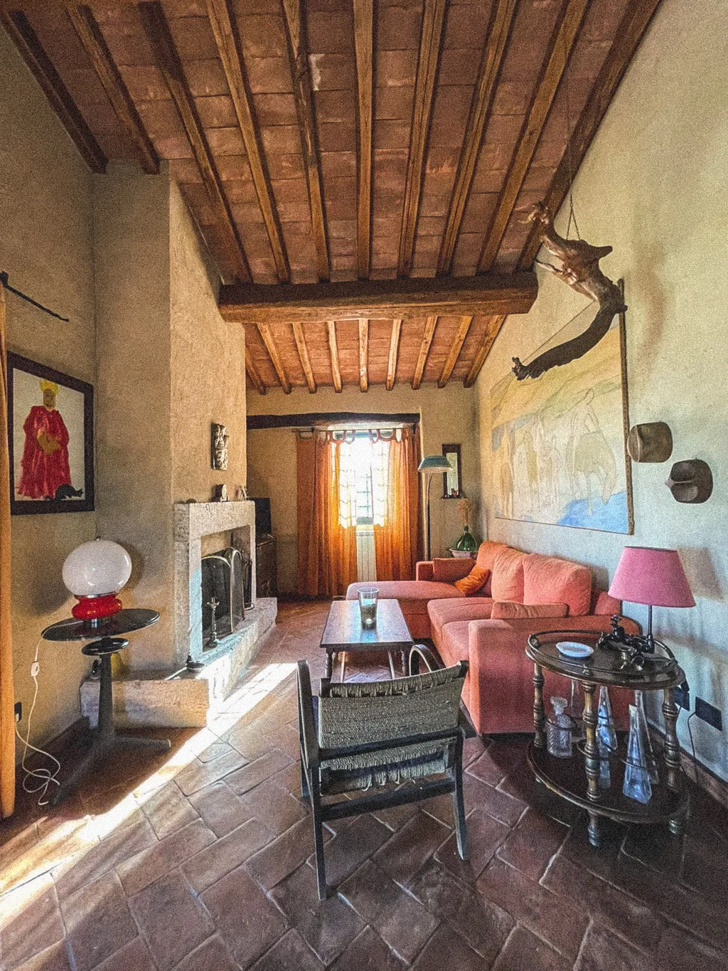 The fireplace and armchairs