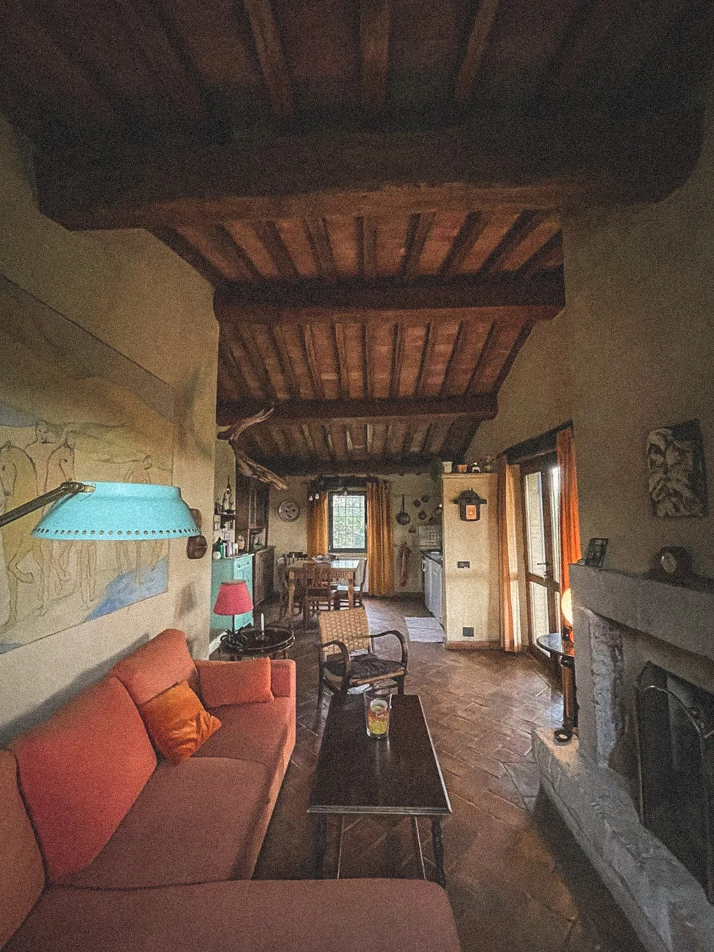 The Casaletto’s little sitting room with the sofa and fireplace